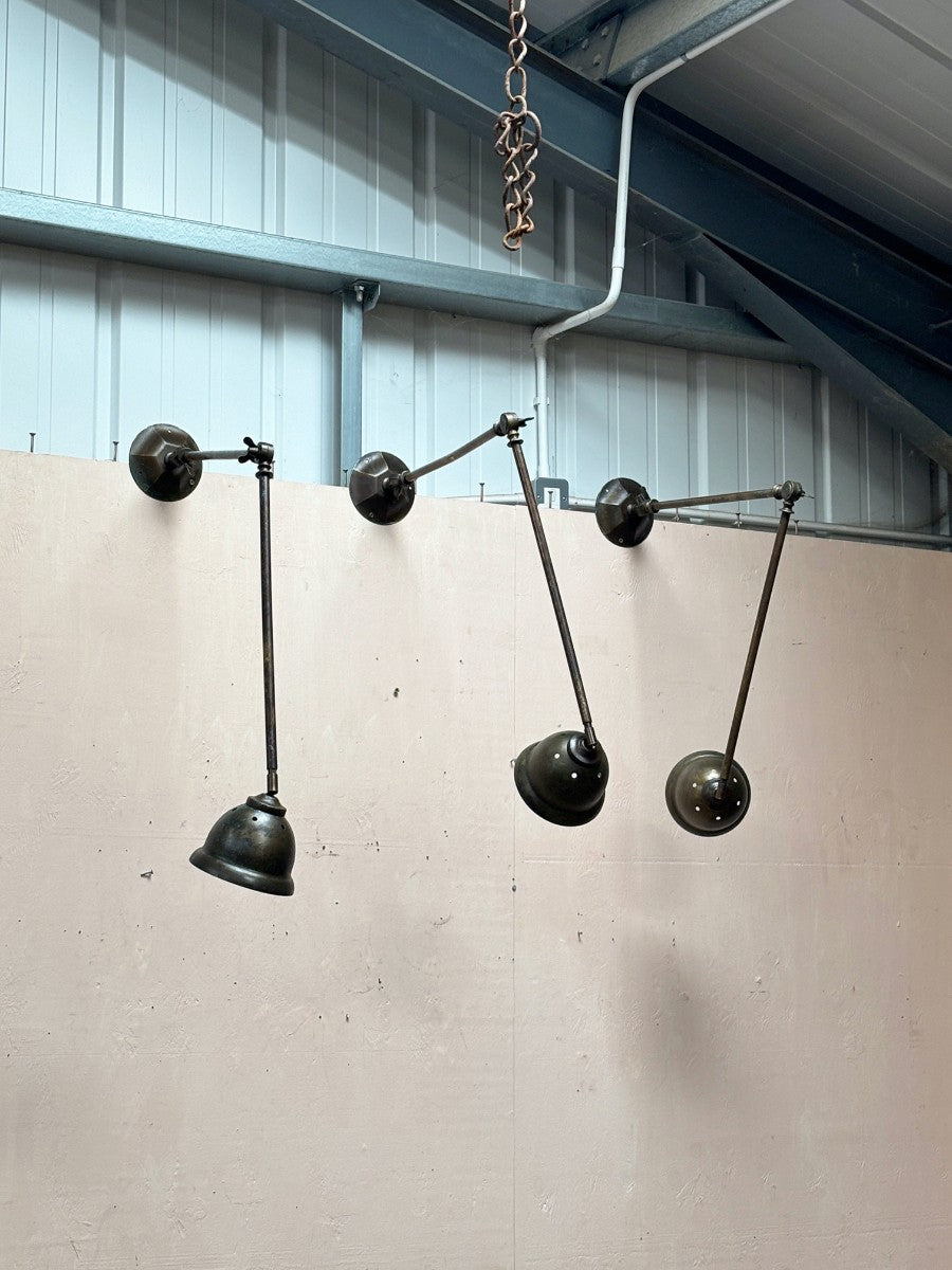 Articulated brass lights
