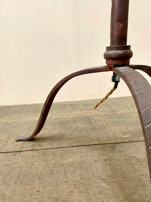 Burgundy coloured standard lamp