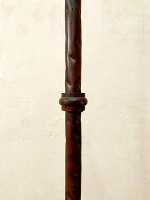 Burgundy coloured standard lamp