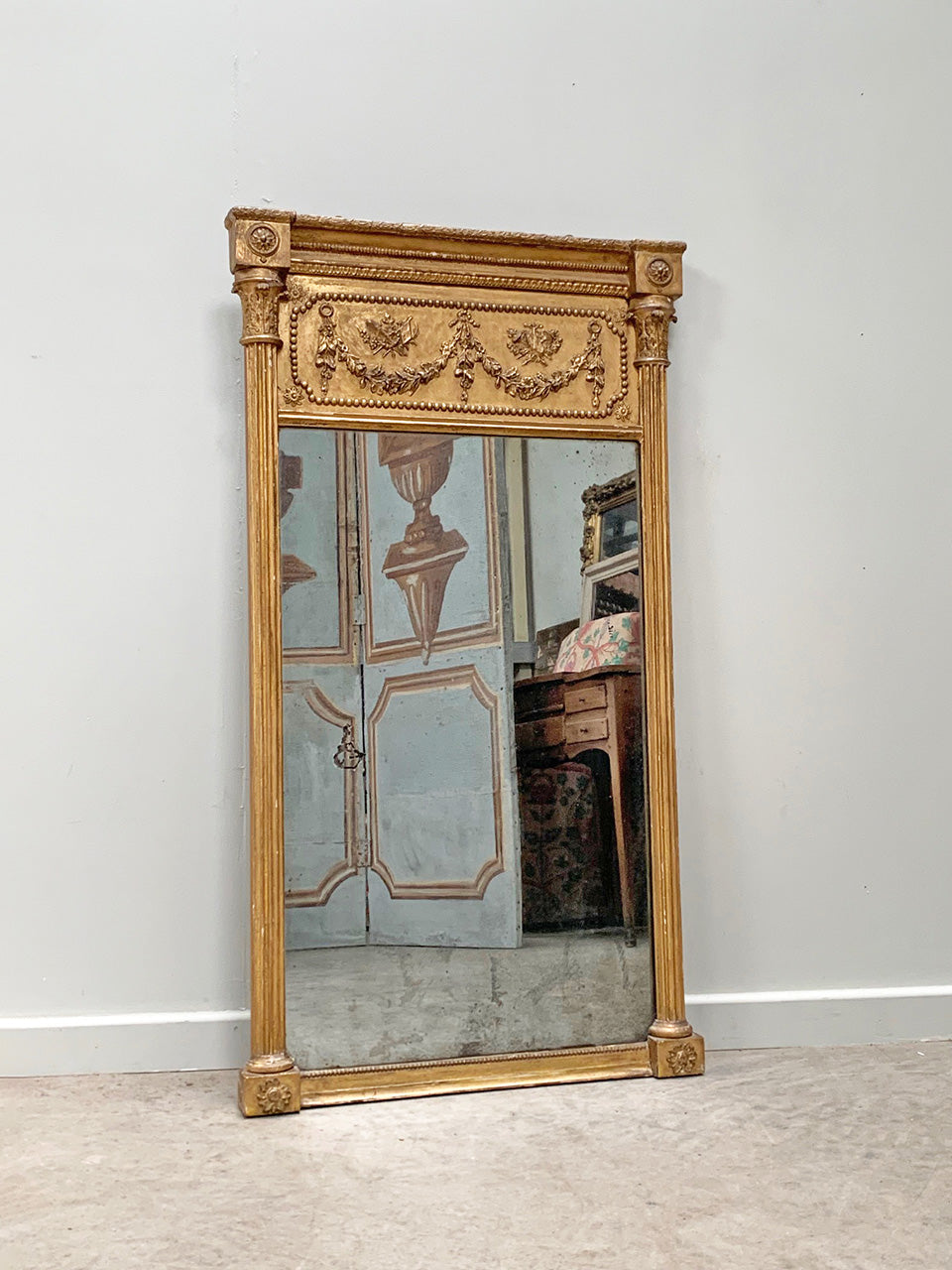 Gilded trumeau mirror