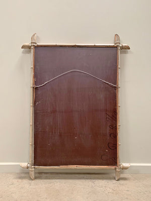 Tall chippy painted faux bamboo mirror