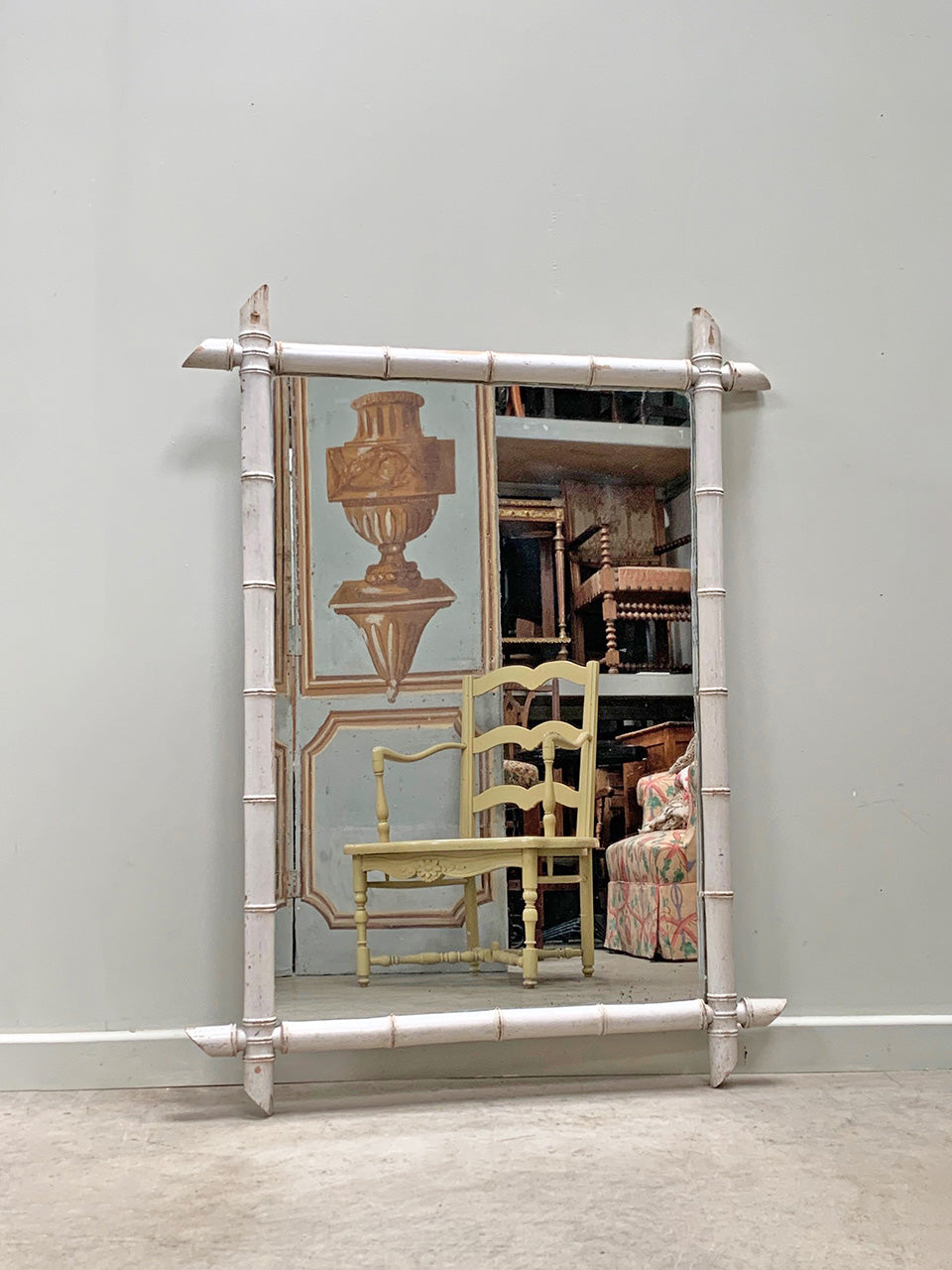 Tall chippy painted faux bamboo mirror