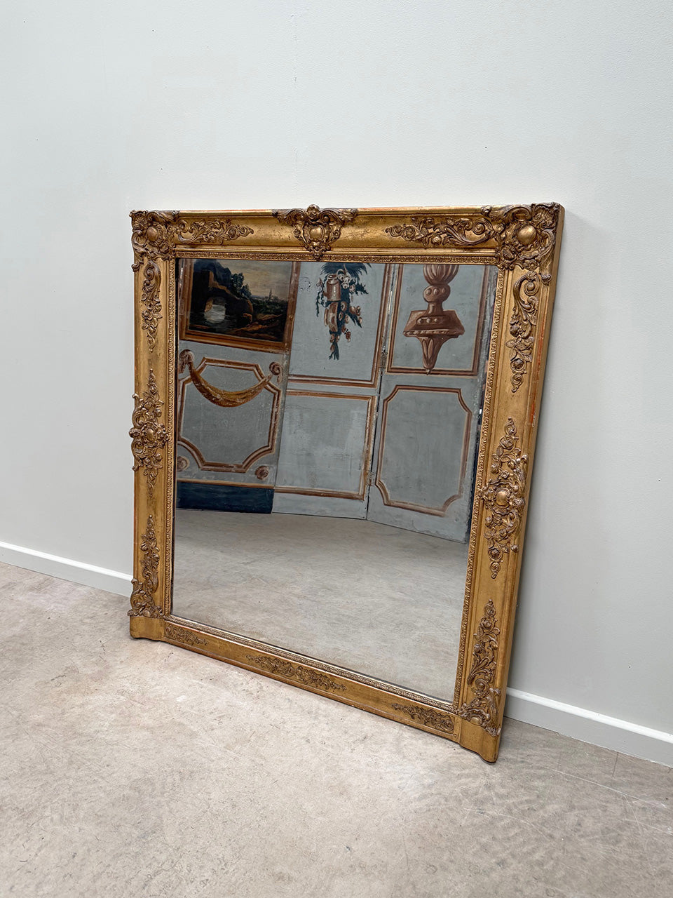 Ornate overmantel mirror