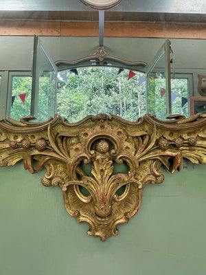 Large carved gilt mirror