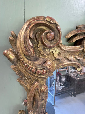 Large carved gilt mirror