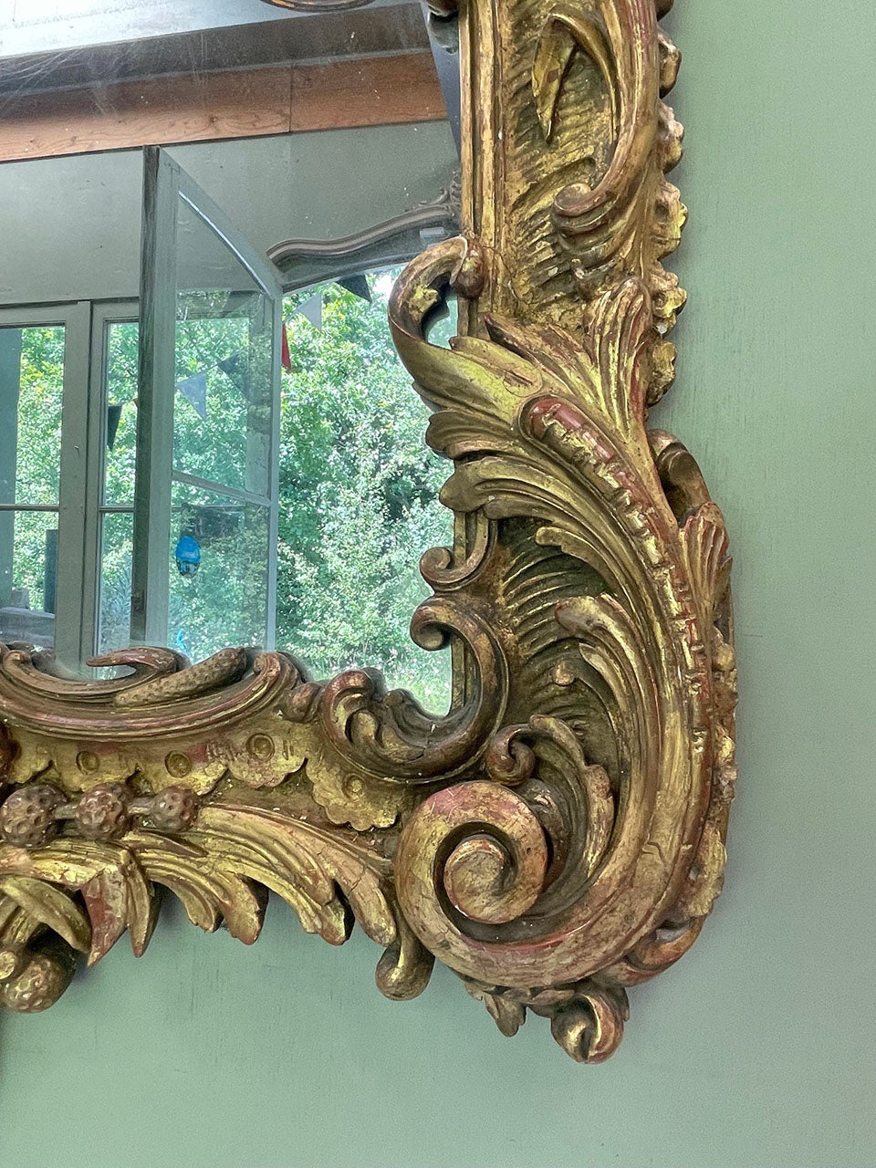 Large carved gilt mirror