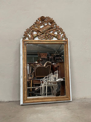 Painted mirror with large crest