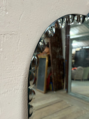 Scalloped edge mirror