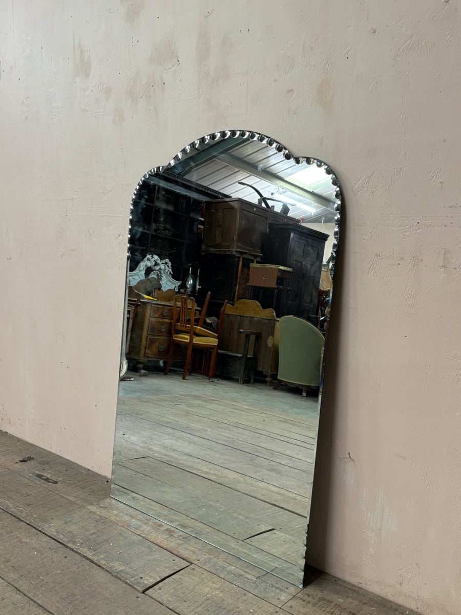 Scalloped edge mirror