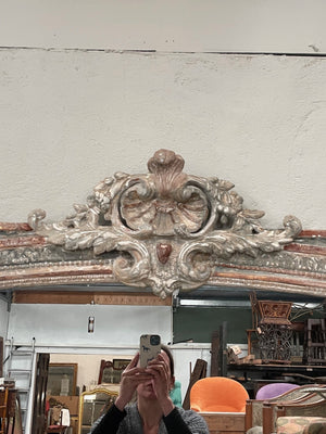 Large painted mirror with crest