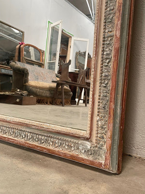 Large painted mirror with crest