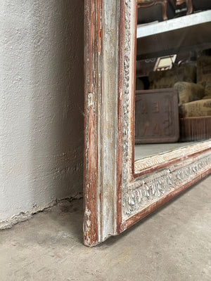 Large painted mirror with crest