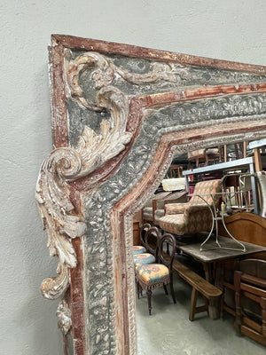 Large painted mirror with crest