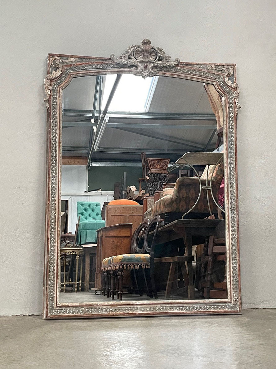 Large painted mirror with crest