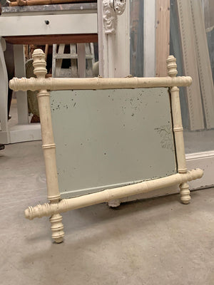 Cream painted faux bamboo mirror