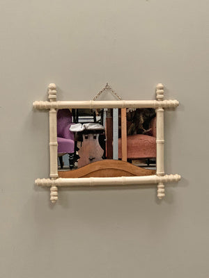 Cream painted faux bamboo mirror
