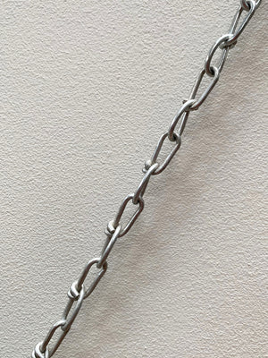 Faux bamboo mirror with long chain