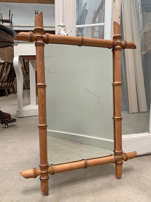 Faux bamboo mirror with long chain