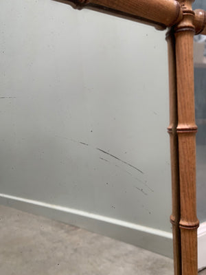Faux bamboo mirror with long chain