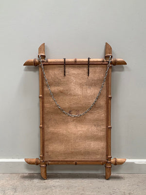 Faux bamboo mirror with long chain