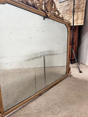 Foxed overmantle mirror