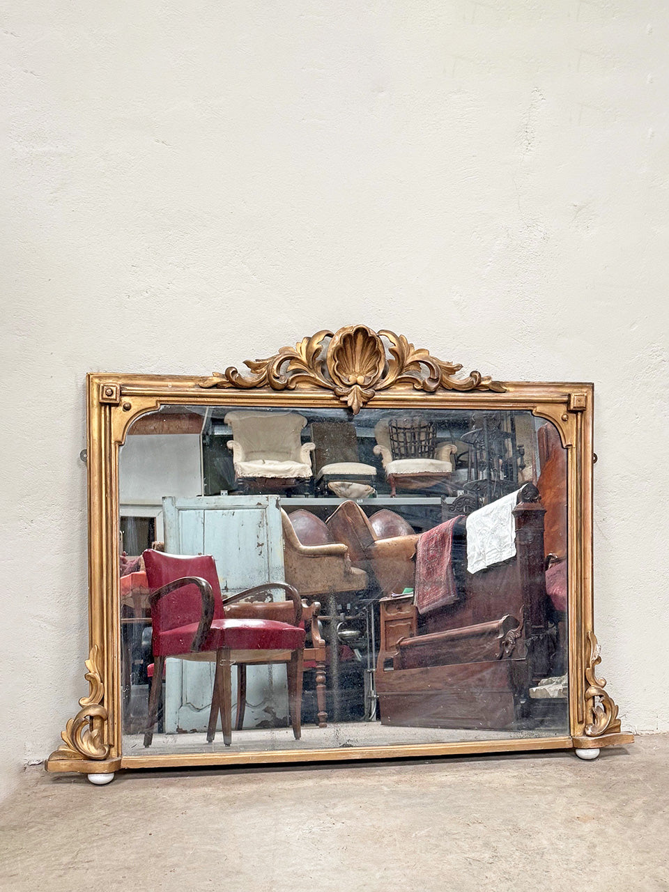 Foxed overmantle mirror