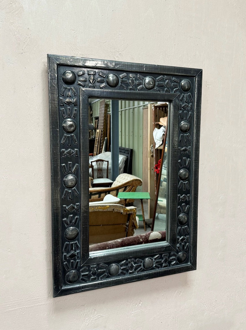 Mirror in ornate pewter frame