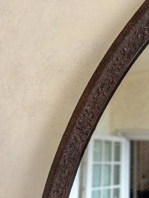 Round wrought iron mirror
