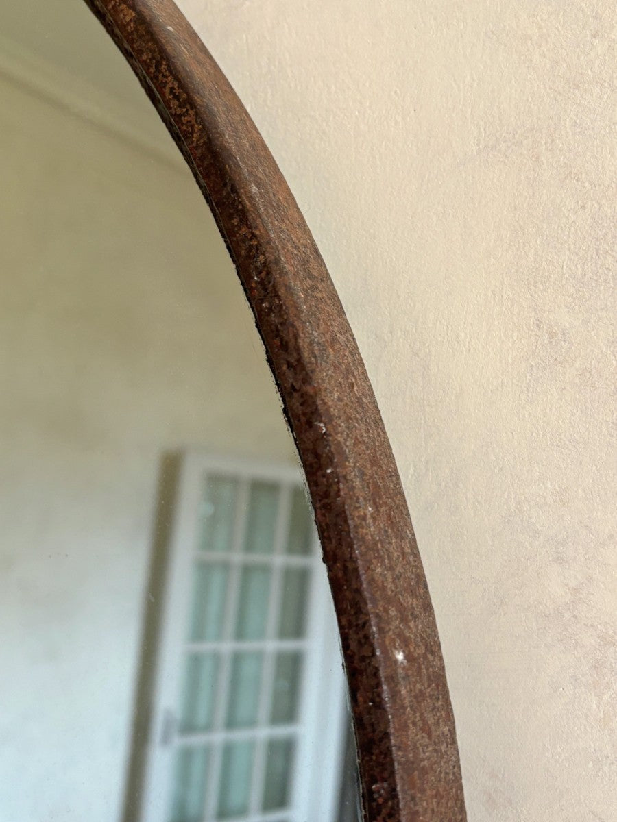 Round wrought iron mirror