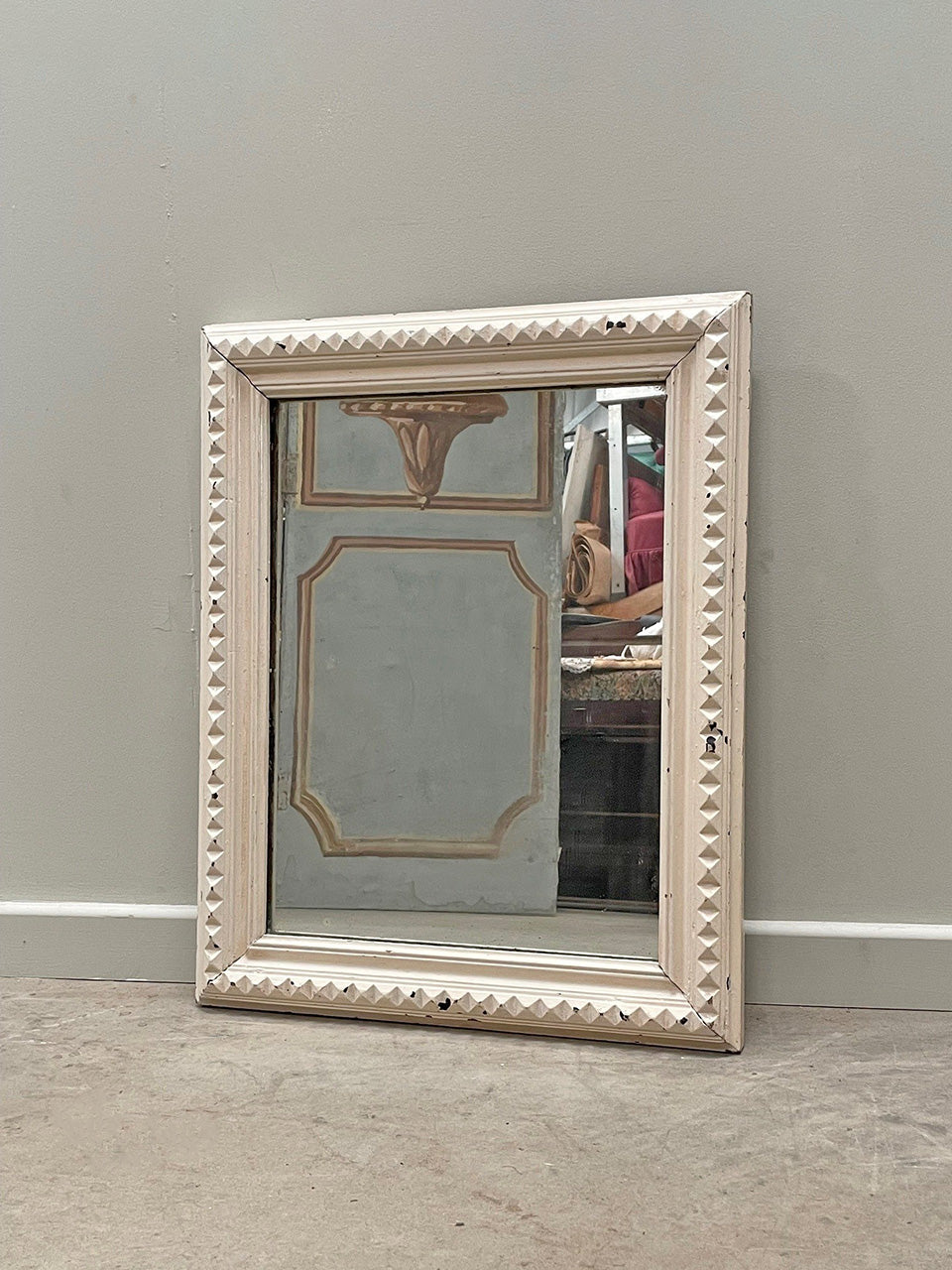 White carved mirror