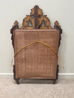 Carved wood mirror