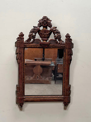 Carved wood mirror