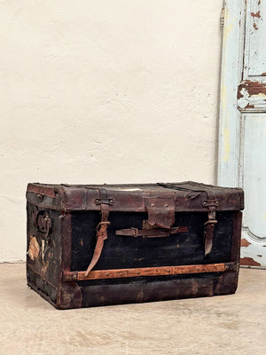 Battered leather trunk