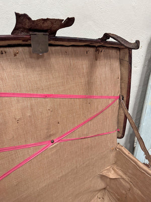 Battered leather trunk