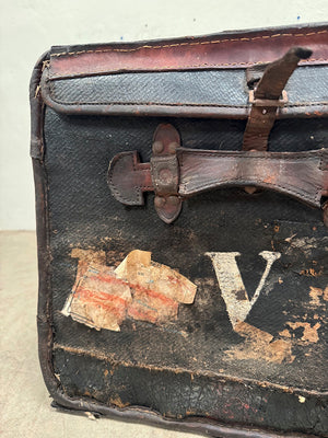 Battered leather trunk