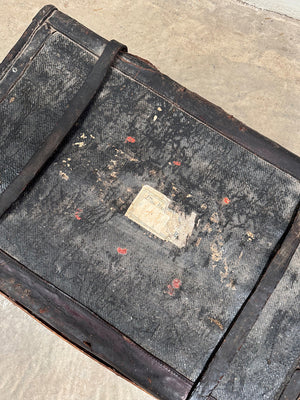 Battered leather trunk