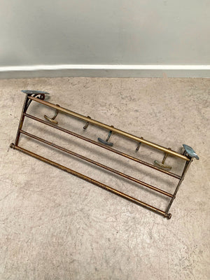 Brass luggage rack