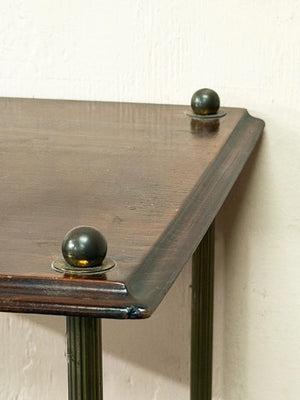 Brass and timber shelves