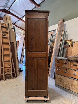 Homme debut / tall cupboard