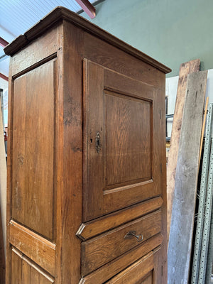Homme debut / tall cupboard