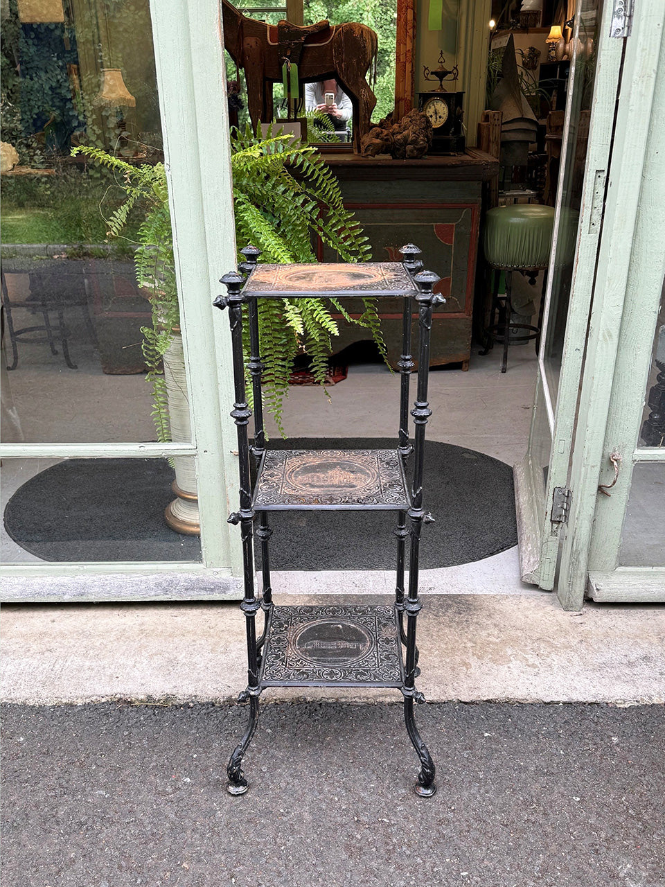 Tiered iron shelf stand