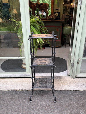Tiered iron shelf stand