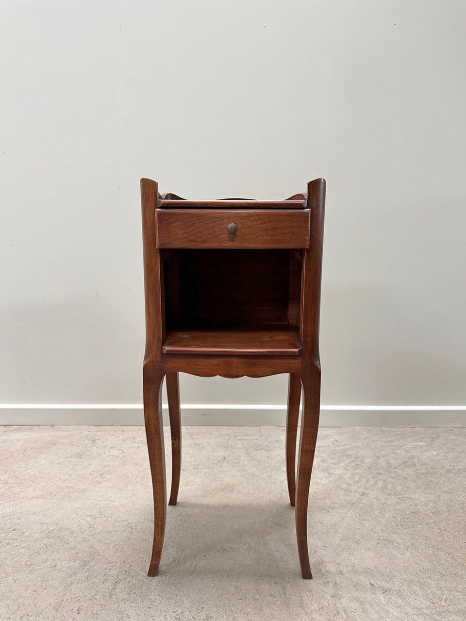 Near pair of bedside cabinets
