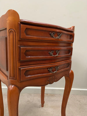 Near pair of bedside tables