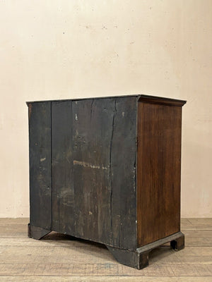 Oak and walnut chest of drawers