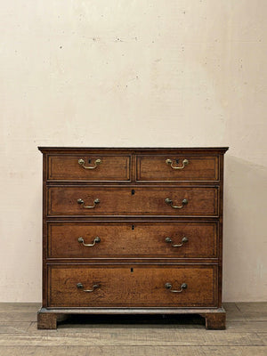 Oak and walnut chest of drawers