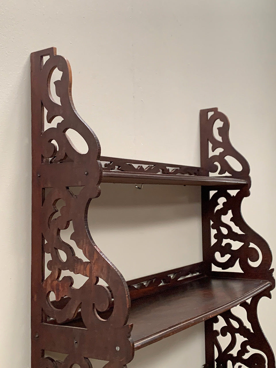 Openwork wall shelves