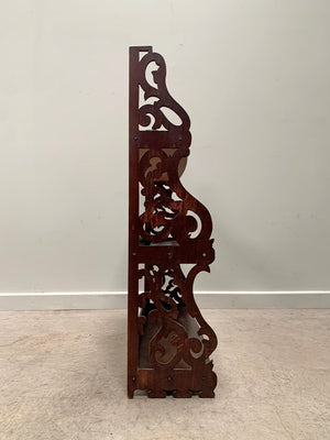 Openwork wall shelves
