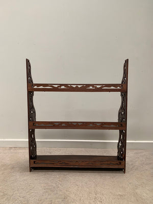 Openwork wall shelves