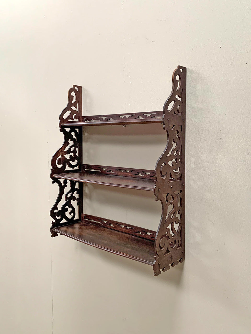 Openwork wall shelves